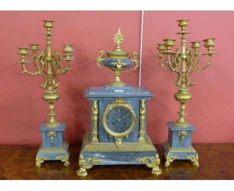 A 19th Century French grey marble and ormolu clock garniture