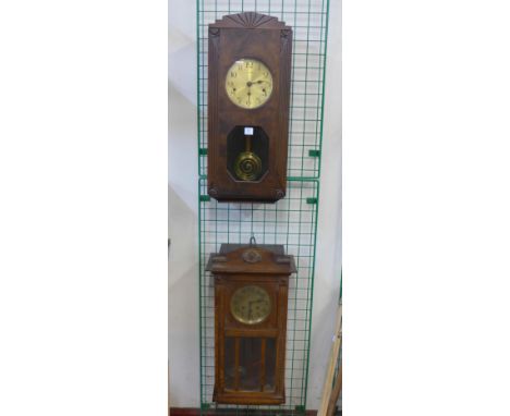 A French Art Deco Ollivier Laval wall clock and one other