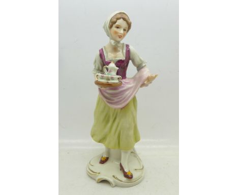 A Goebel figure of a lady, 18cm
