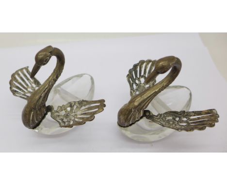 A pair of silver and glass swan trinket pots