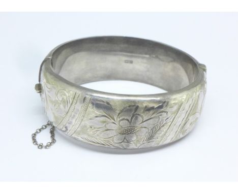 A silver bangle, 36g