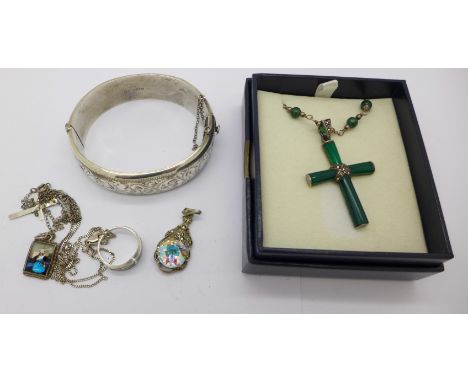 A silver bangle and other silver jewellery