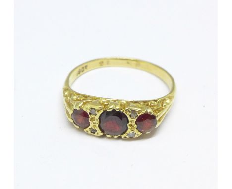 An 18ct gold, ruby and diamond ring, 2.8g, L