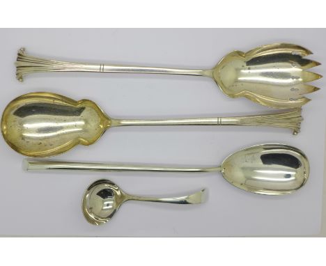 A pair of plated salad servers, a silver serving spoon and a silver sauce ladle, (silver 76g)