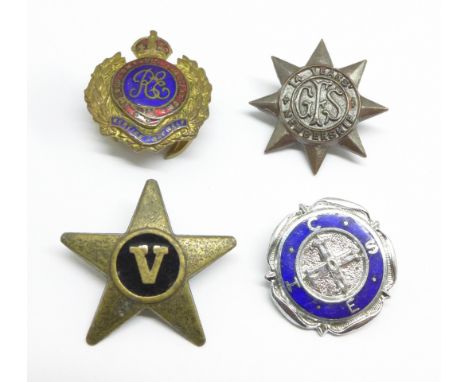 Four badges including an enamel Old Comrades' Association