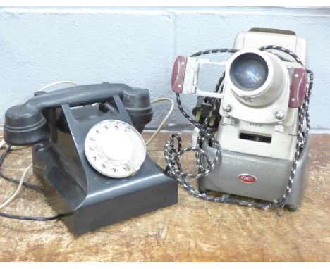 A Bakelite telephone and an Aldis slide projector