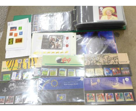 An album of stamps including First Day Covers, over sixty Royal Mail Mint stamp sets and Millennium stamps