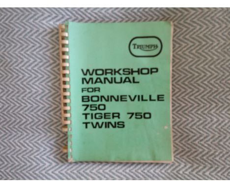 Triumph Workshop Manual For Bonneville 750 Tiger 750 Twins Bound paperback book. Binding has some rings missing near the base