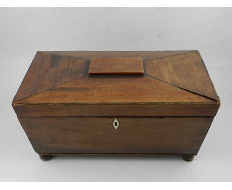 A 19th century mahogany tea caddy. H: 17cm W: 33cm D: 19cm