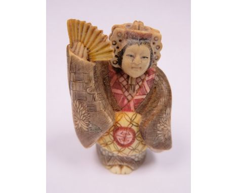 HEAVILY CARVED IVORY NETSUKE, SIGNED TO BASE