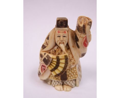 HEAVILY CARVED IVORY NETSUKE, SIGNED TO BASE 