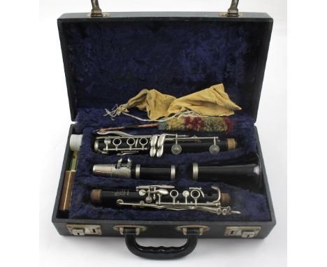 A Boosey &amp; Hawkes 'Regent' clarinet in blue-lined black Moroccan leather case, with cleaning implements, width of case 35