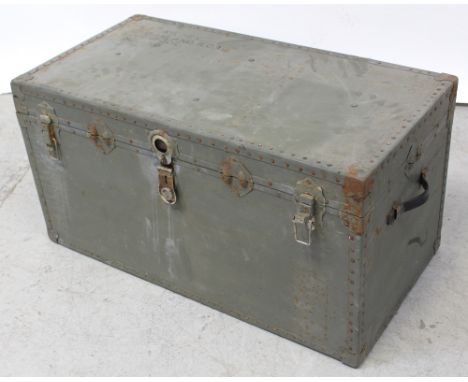 An early 20th century metal green painted travel trunk with stud decoration and leather carrying handles, 51 x 98cm.