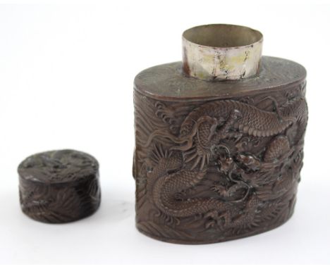 A bronzed Oriental tea caddy with stylised relief decoration, height 11cm.
