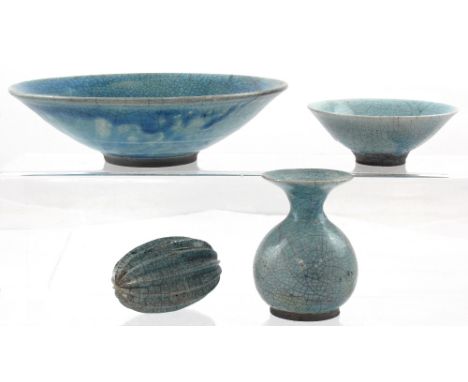 Four pieces of 19th century turquoise glazed Chinese pottery to include a vase, citrus squeezer and bowl (4).