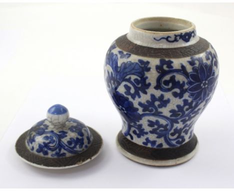 A small Chinese porcelain crackle glaze baluster vase and cover with brown banding to the lid, shoulder and foot-ring, with b