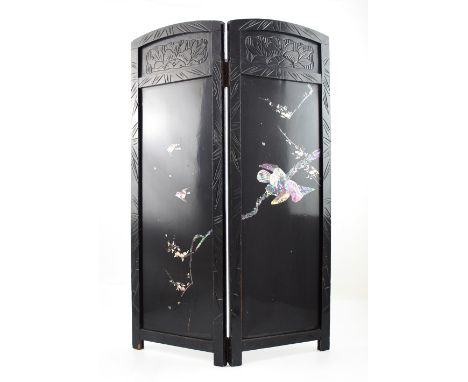 A Meiji period black lacquered two-panel Shibayama screen with mother of pearl bird and cherry blossom decoration, each panel