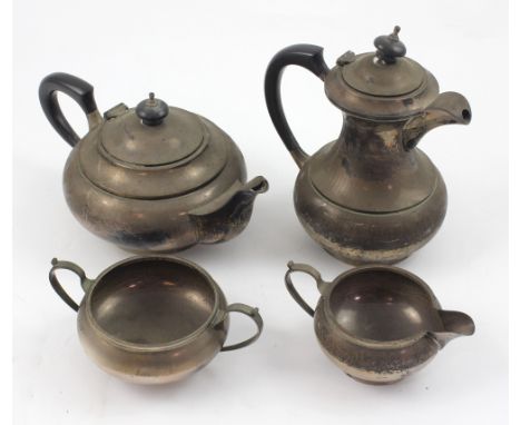 An Elizabeth II hallmarked silver four-piece tea service, Walker &amp; Hall, Sheffield 1962, comprising teapot, hot water jug