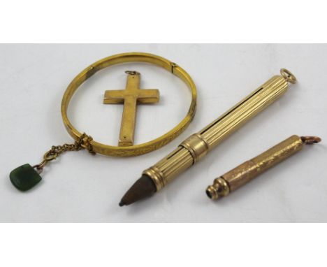 A 9ct gold pendant pencil holder and a similar example, a gold bangle with jade pendant and a 9ct gold cross, approx combined