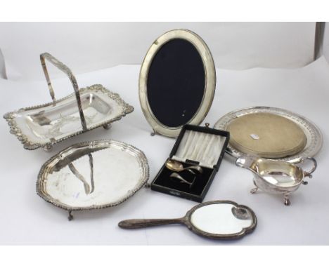 A good collection of silver and plated ware to include an 800 grade silver picture frame of oval form, a silver and engine-tu