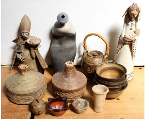 A collection of studio ceramics to include two lamp bases by Priscilla Fursdon, a figure of a bishop with a plate of chicken,