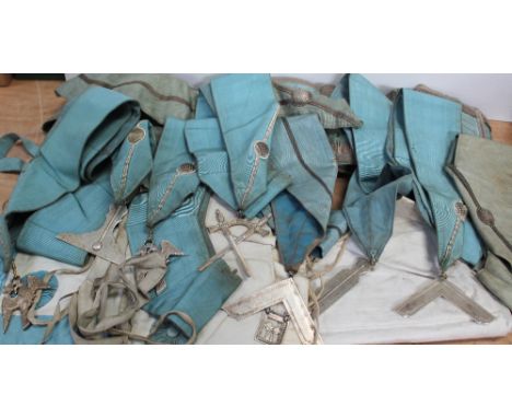 A good collection of Masonic aprons, sashes, jewels and Masonic tools to include a small cased set for presentation purposes 