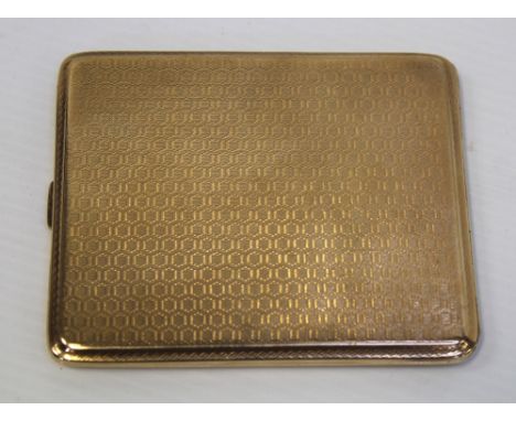 A 9ct gold engine-turned cigarette case, approx 112g.