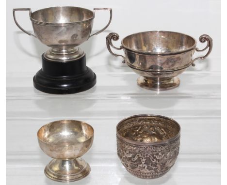 A hallmarked silver trophy on stand, FH Adams &amp; Co, Birmingham 1924, a stem cup, a Victorian bowl and sucrier, approx com