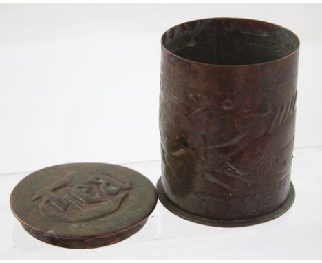 A Newland School tooled copper tea caddy with chased relief lid marked 'Tea', the body decorated with perch and angel fish an