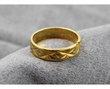 A 22ct gold ladies' wedding band, size K, approx 4.2g.