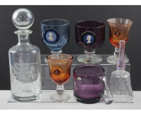 A quantity of Wedgwood glass to include a royal coat of arms decanter celebrating the Silver Jubilee, a blue goblet with pale