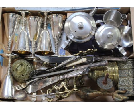 A 1960s stainless steel designer tea service comprising teapot, hot water jug, milk jug and sugar bowl, a Maltese ormolu dolp