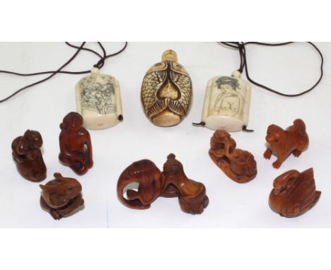 Two late 19th/early 20th century Japanese three cased bone inro, both with pen and ink decoration of erotic scenes, a bone sn