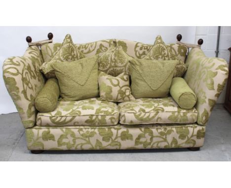 A Knole-style sofa with hinged sides and high back to wooden block supports, length 190cm.