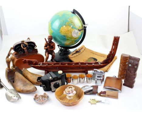 An Imari hand-carved tourist boat and stand, various Imari hand-carved figures, a Kodak Brownie Cresta camera, a hip flask an