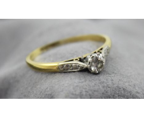 An 18ct gold diamond solitaire ring, size K 1/2, approx 1.9g.