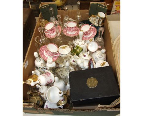 A collection of ceramic and glass bells and other items.
