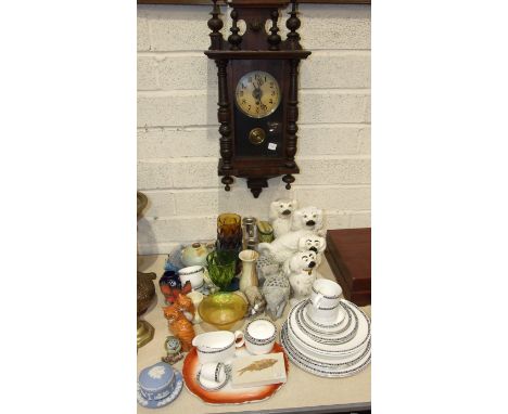 A stained wood case wall clock, two pairs of Staffordshire dog ornaments, a modern globe on copper stand, other ceramics, gla