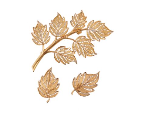  A pair of gold coloured filigree leaf earrings,   designed as leaves, with post fittings, 2.2cm long; together with a matchi