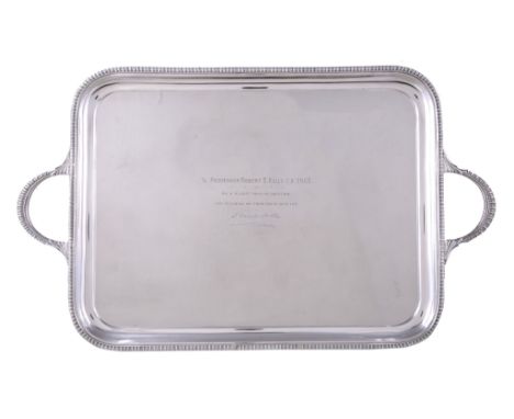  A silver rectangular twin handled tray by James Dixon  &  Sons Ltd,   Sheffield 1931, with a raised gadrooned rim and handle