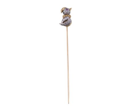  A 1970s diamond set bird stick pin,   the wings and head set with eight cut diamonds, the eye set with a circular cut ruby, 