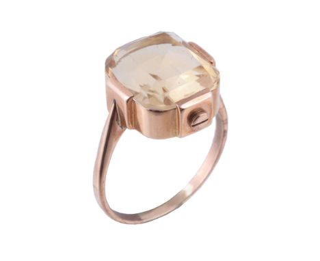  A citrine dress ring,   the cushion cut citrine in a claw setting with screw detail, finger size R 