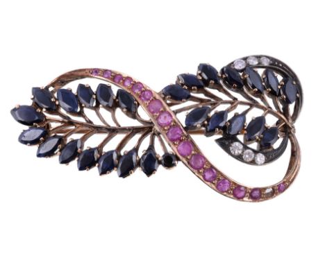  A ruby, sapphire and diamond brooch,   the stylised foliate brooch set with circular cut rubies, marquise cut sapphires and 