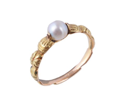  An early 19th century French Neo-Renaissance gold ring,   circa 1820,  centred with a swivel set pearl, between fluted and f