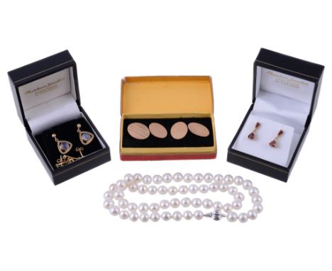  A pair of 9 carat gold moonstone earrings,   the circular cabochon moonstone in a triangular setting, with post fittings, st