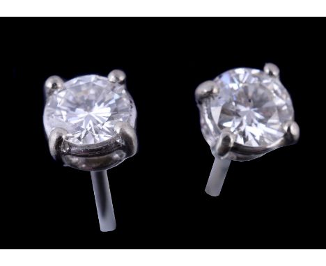  A pair of diamond ear studs,   the brilliant cut diamonds, approximately 0.40 carats total, with post fittings 
