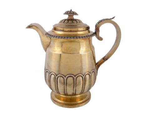  A late George III silver gilt coffee jug by John Wakefield,   London 1819, the lobed button finial with a turned ivory space