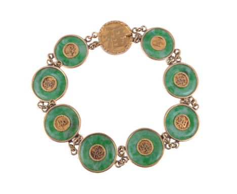  A 1920's Chinese export jadeite jade panel bracelet by Wang Hing,   the circular jadeite jade discs with applies Chinese cha
