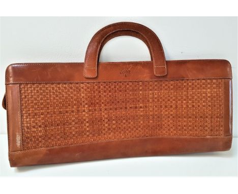 VINTAGE MULBERRY HANDBAGin woven tan leather of elongated form with fixed loop handles, typical tartan lining and Mulberry br