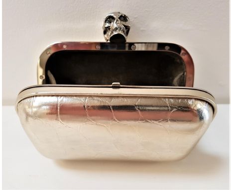 ALEXANDER McQUEEN CLUTCH BAGwith crystal embellished skull clasp, the bag with metallic finish, 14cm wide 
